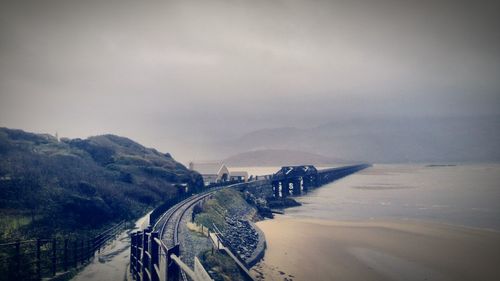 High angle view of railroad track by sea