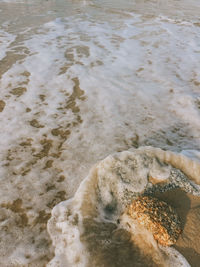 High angle view of sand at beach