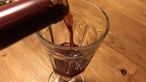 High angle view of wine glass on table