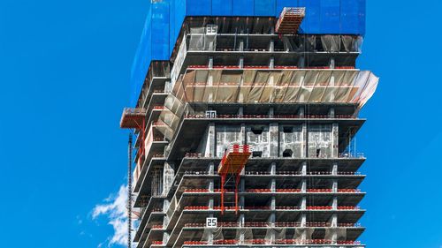 Low angle view of building during construction