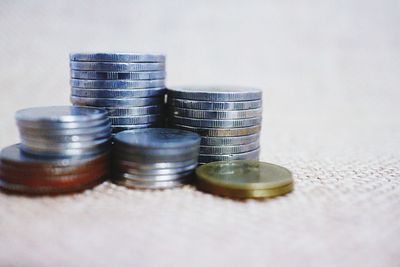 Close-up of coins on table