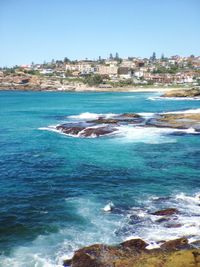 View of sea against blue sky