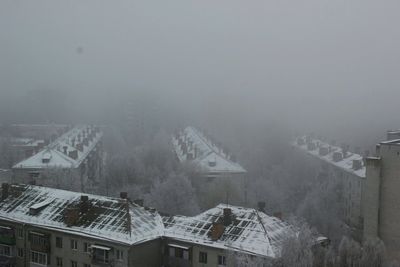 High angle view of snow covered buildings