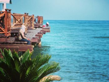 Scenic view of sea against blue sky