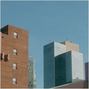 Low angle view of modern buildings against sky