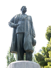 Low angle view of statue against clear sky in park