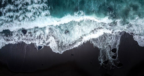 Sea waves splashing on shore