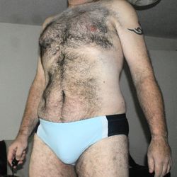 Midsection of shirtless man