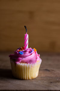 Close-up of cupcakes on cake