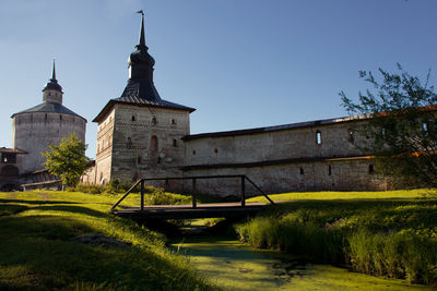 Low angle view of old ruins against clear sky