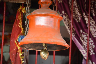 Close-up of lantern hanging in temple