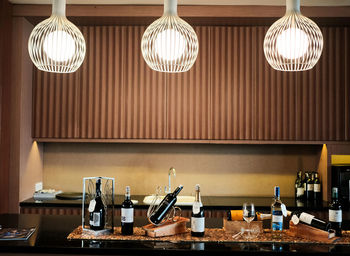 View of illuminated electric lamp on table in restaurant