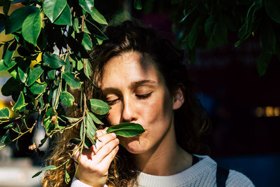 Portrait of woman holding food