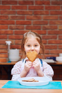 Portrait of a girl eating food