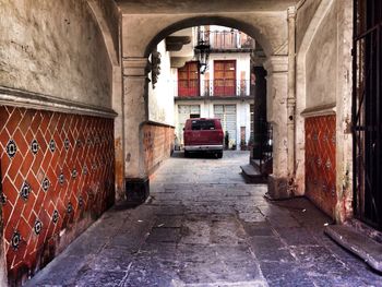 Narrow alley along buildings