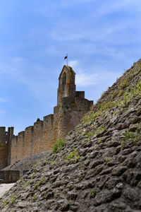 Low angle view of historic building against sky
