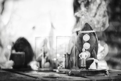 Close-up of cross on table