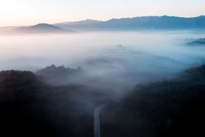 Scenic view of mountains against sky during sunset