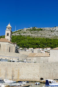 Exterior of historic building against clear blue sky