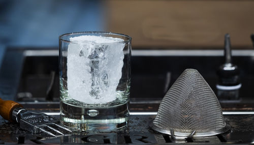 Close-up of wine glass on table