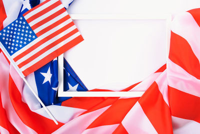 Close-up of flag against blue sky