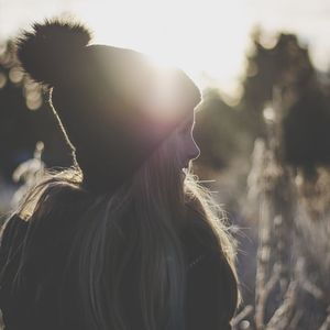 Portrait of woman against sky