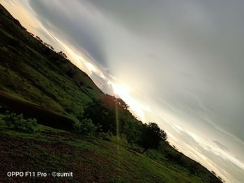 Scenic view of landscape against sky during sunset