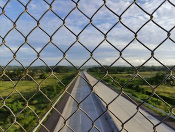 Full frame shot of chainlink fence on field