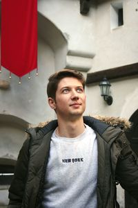 Portrait of young man looking away