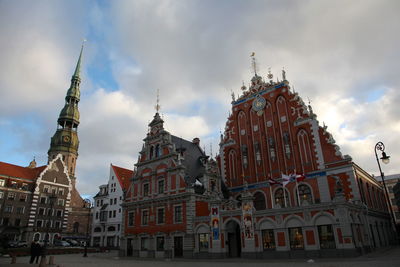 Panoramic view of buildings in city against sky