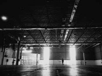 Man in illuminated room