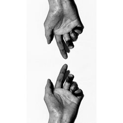 Close-up of woman hand over white background
