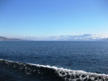 Scenic view of sea against clear sky