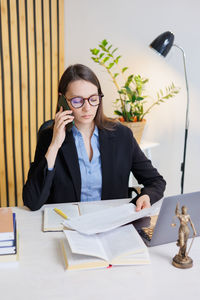 Businesswoman working at office