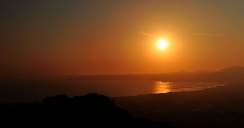 Scenic view of sunset over sea