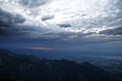 Scenic view of mountains against dramatic sky