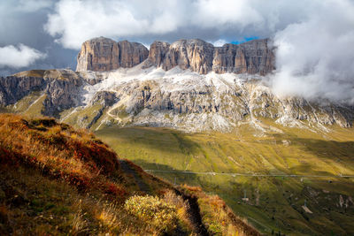 View of landscape and mountains against sky