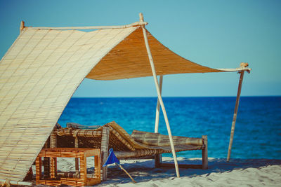 Camp beds on beach