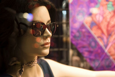 Close-up of mannequin at store window
