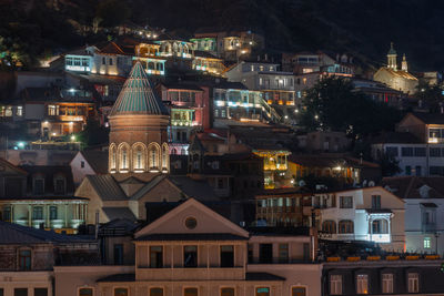 High angle view of buildings at night