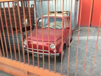 High angle view of red car on wall