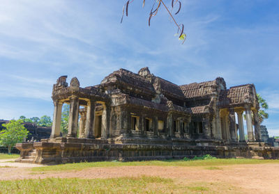 Temple against cloudy sky