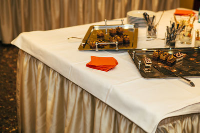 High angle view of desserts served on table in restaurant