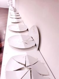 Broken plates on table in restaurant