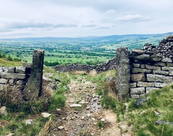 Panoramic view of old ruins against sky