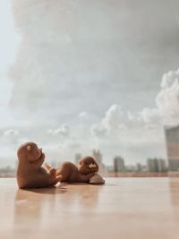 Portrait of shirtless man lying on floor
