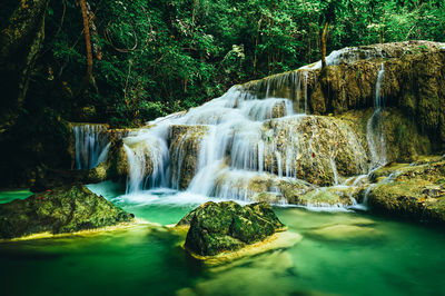 Beautiful waterfall in the rainforest.erawan waterfall in erawan national park,thailand