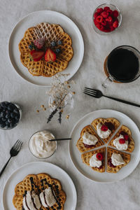 High angle view of waffles on plates