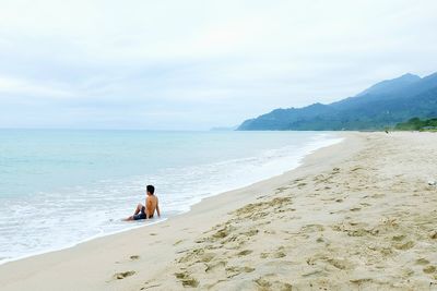 Scenic view of beach against sky