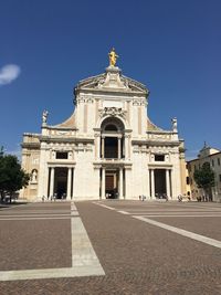 Facade of historic building against sky